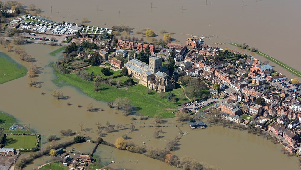 Aerial view showing flooding in Tewkesbury. The Abbey is the focus point on higher ground.