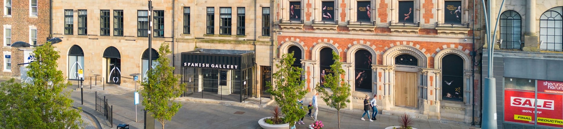 Detail of a market town square including historic buildings repurposed as a gallery.